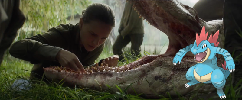 From left to right: Lena (Natalie Portman) inspecting a Shimmered crocodile whose genes have been mixed with those of a shark and Feralgatr, a water type Pokémon.